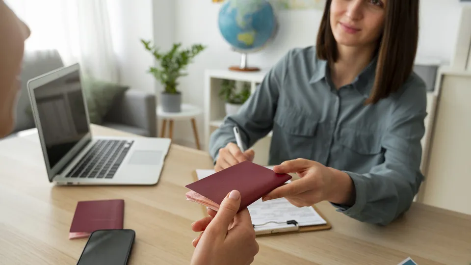 Counsellor helping a student with visa documents